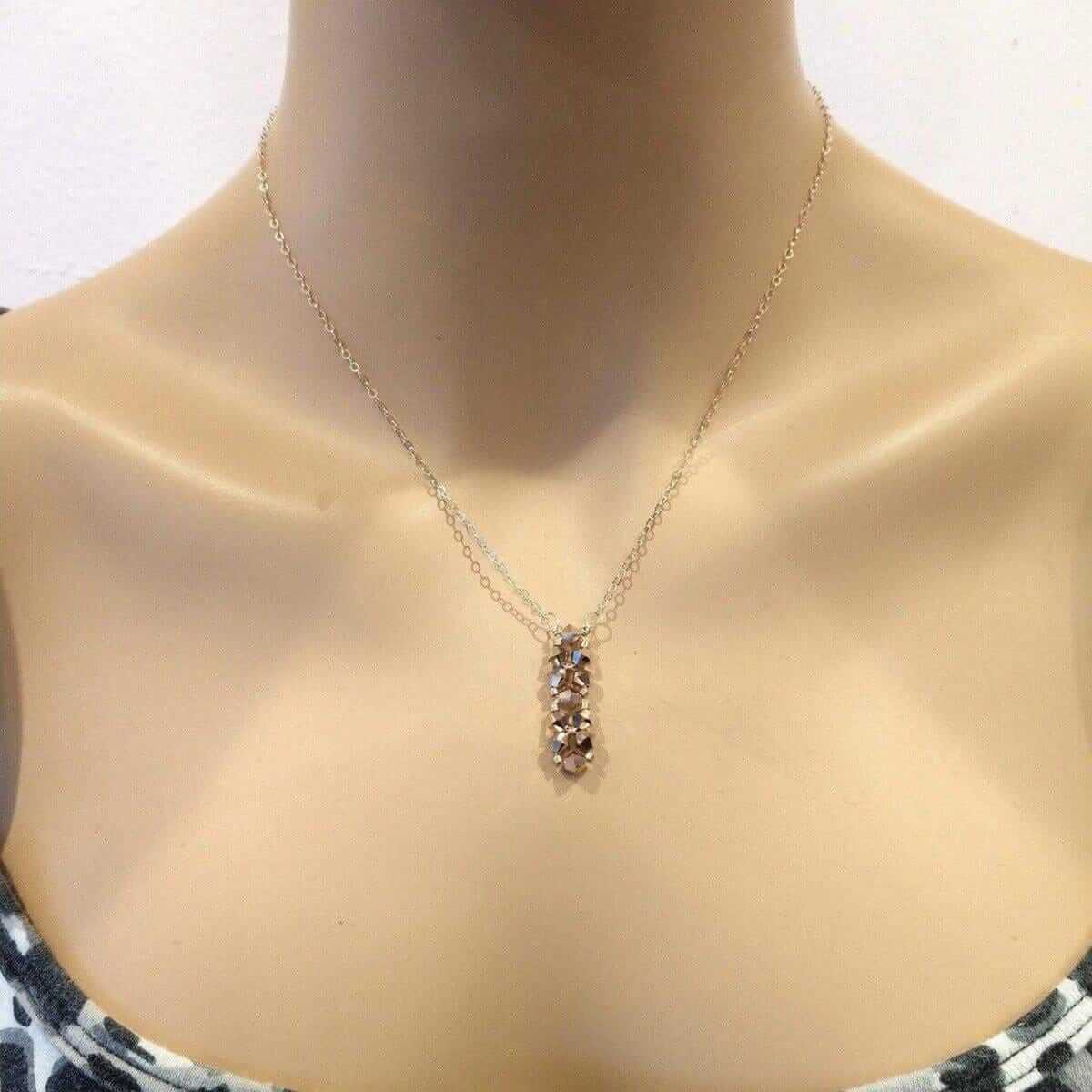 Necklace with a pendant on a mannequin