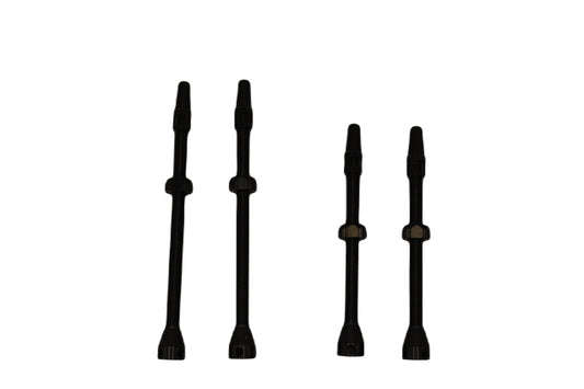 Four black cylindrical valves on a white background