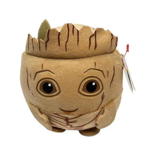 Plush toy resembling a character with a tree-like appearance on a white background