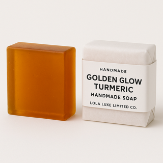 Bar of Turmeric soap and its packaging on a white background