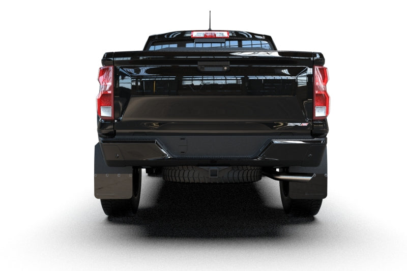 Black pickup truck shown from a rear three-quarter angle on a white background