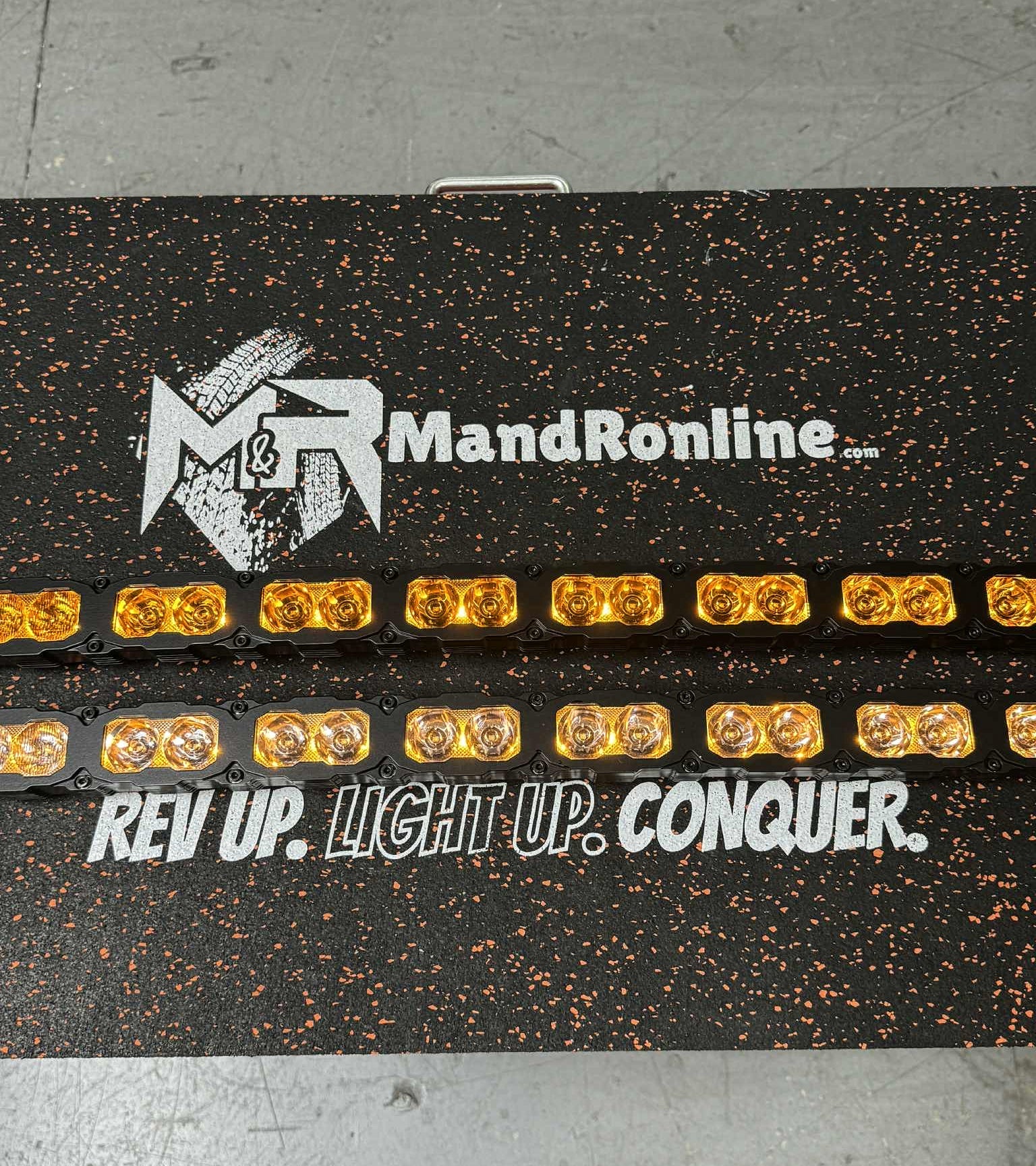 Mand Ronline LED light bar packaging with branding and text on a gray surface