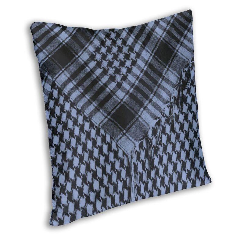 Plaid patterned fabric pillow on a white background
