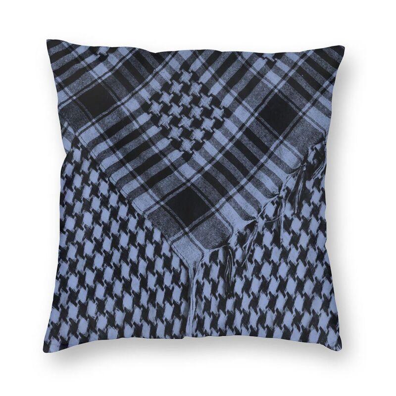 Plaid patterned pillow with a white background