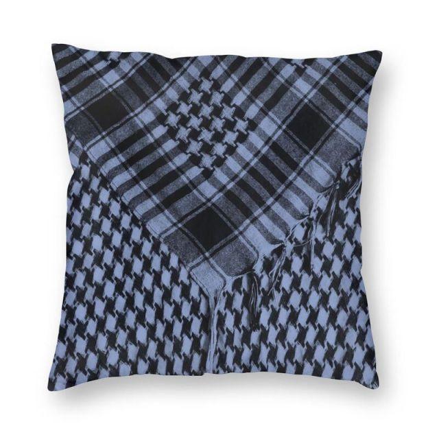 Plaid patterned pillow with a white background