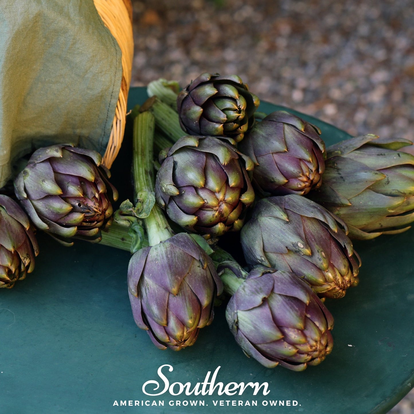 Artichokes on a green plate with 'Southern' branding.