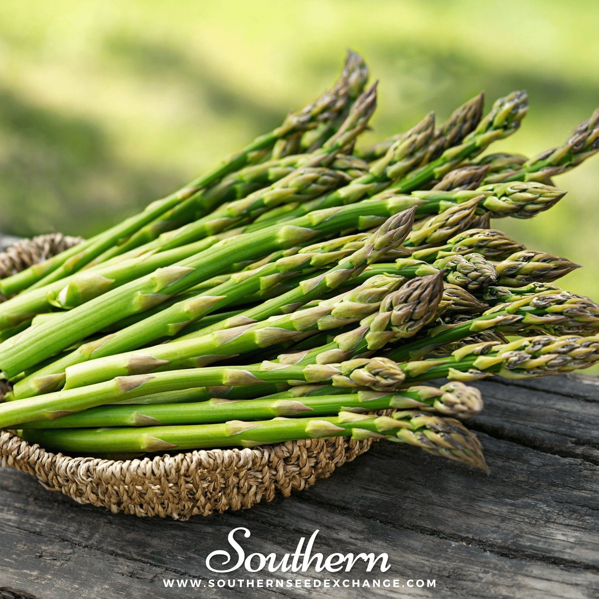 Bunch of green asparagus on a wooden surface with 'Southern' branding.