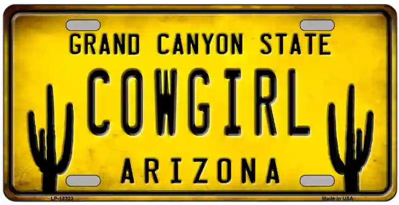 License plate with 'Grand Canyon State Cowgirl Arizona' text and cactus designs on a yellow background