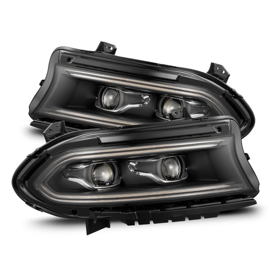 Pair of black car headlights on a white background