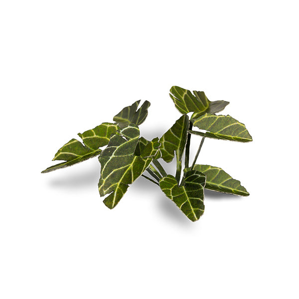 Artificial green leaves on a white background