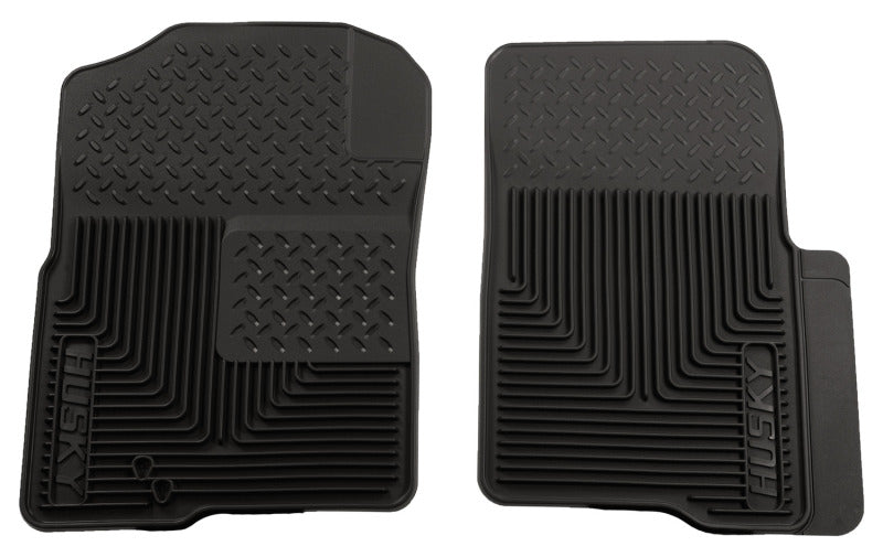 Pair of black car floor mats with a textured pattern on a white background