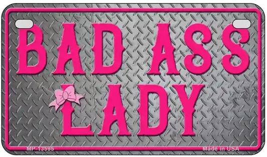 Motorcycle license plate with 'BAD ASS LADY' text in pink on a gray background