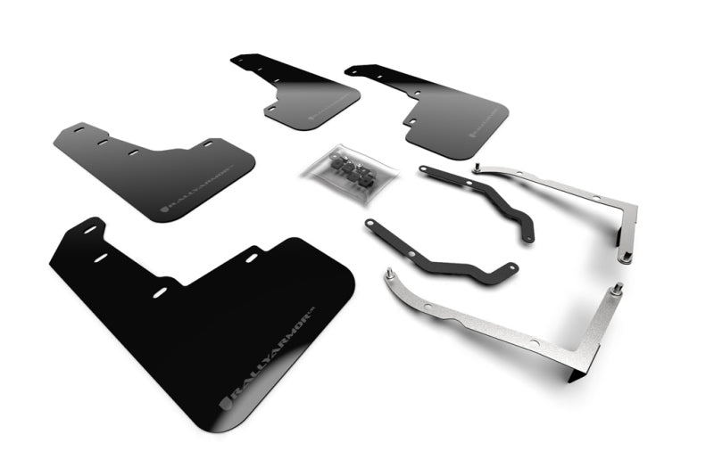 Set of car accessories including mud flaps and metal brackets on a white background
