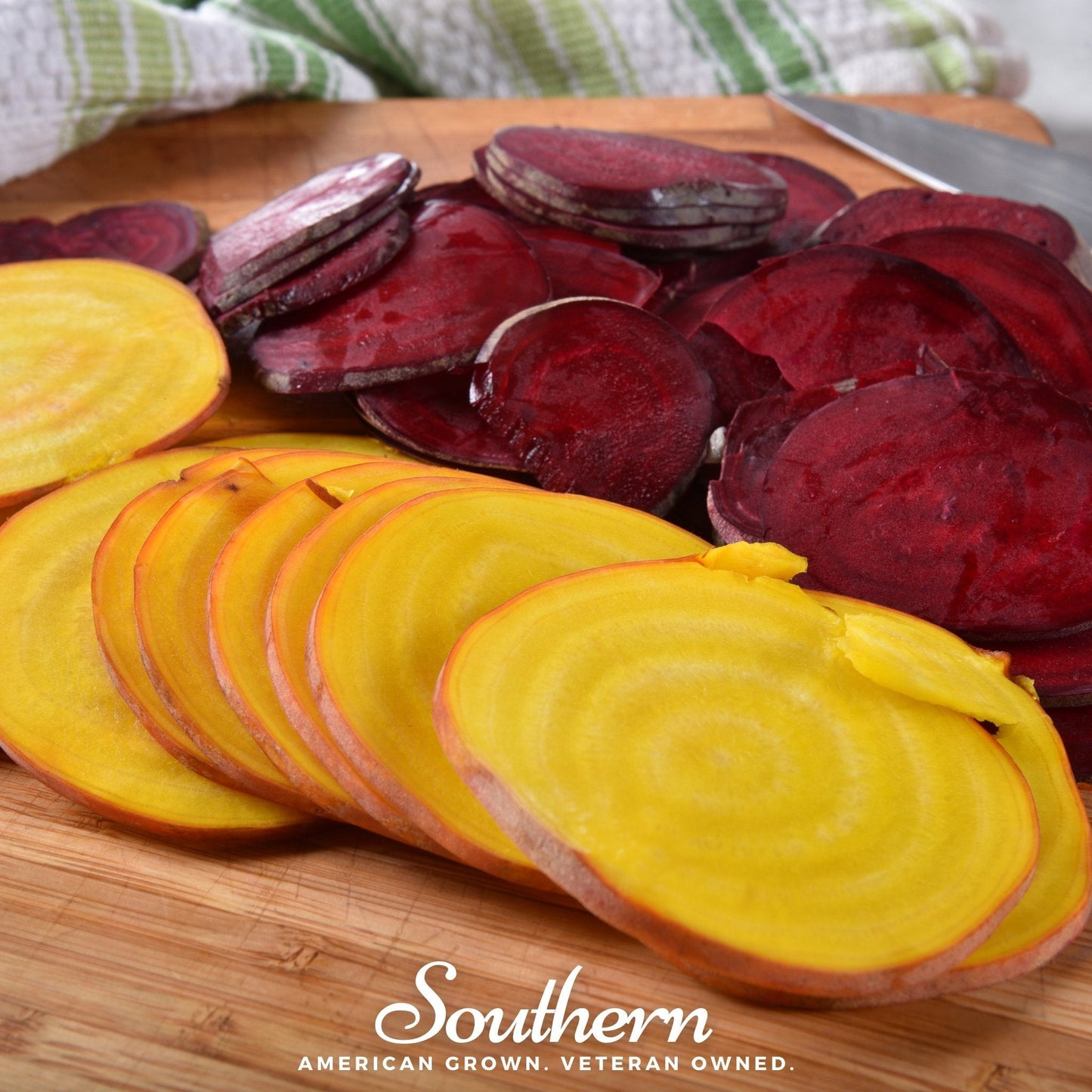 Sliced yellow and red beets on a wooden cutting board with 'Southern' branding.