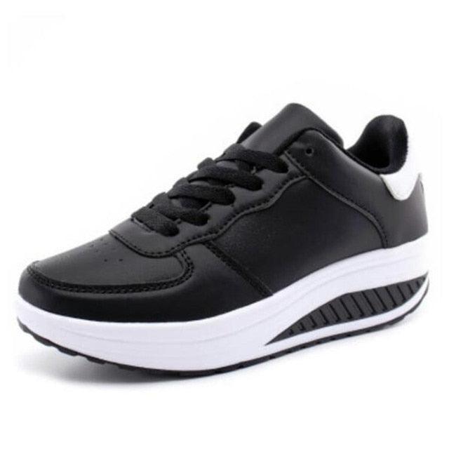 Black and white sneaker on a white background