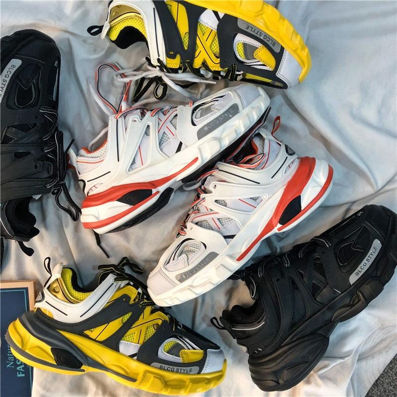 Collection of colorful sneakers on a light gray surface
