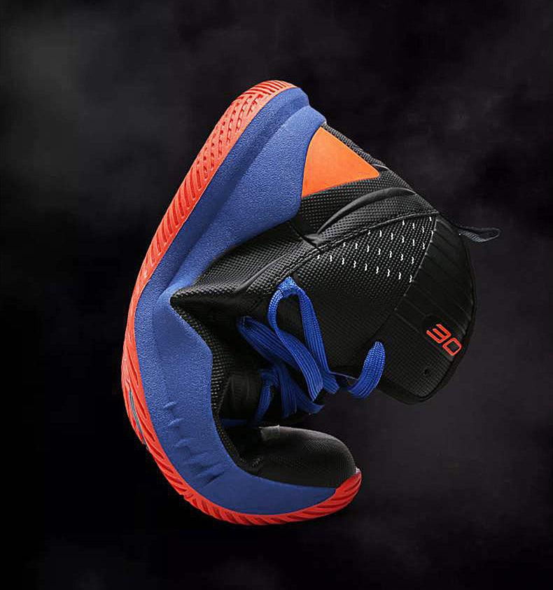 Basketball shoe with black, blue, and red design on a dark background