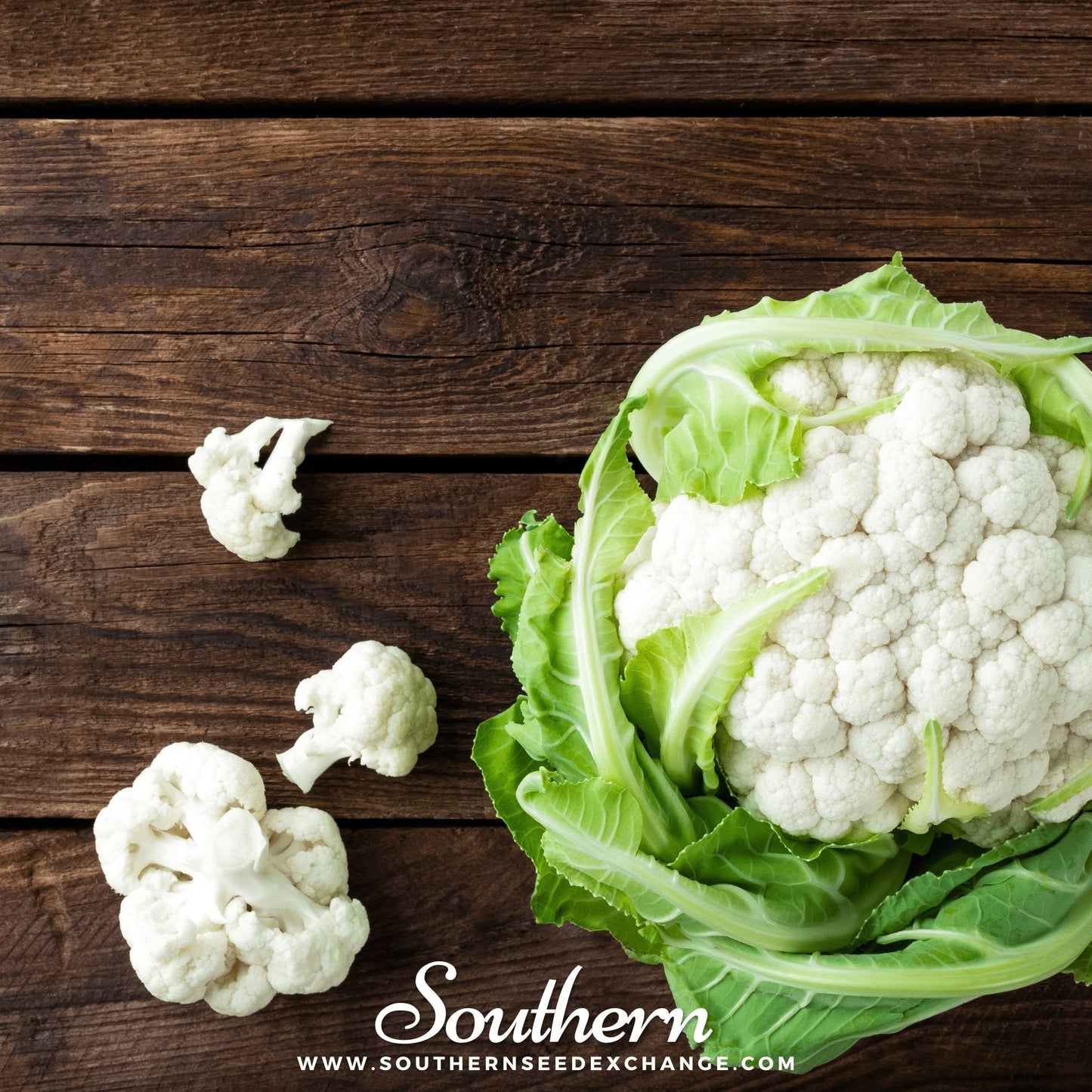Cauliflower on a wooden surface with 'Southern' branding.