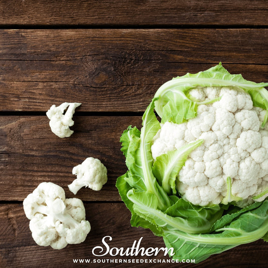 Cauliflower on a wooden surface with 'Southern' branding.