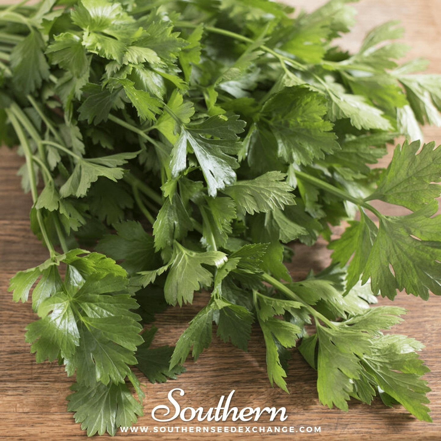 Bunch of fresh green celery on a wooden surface with 'Southern' branding.