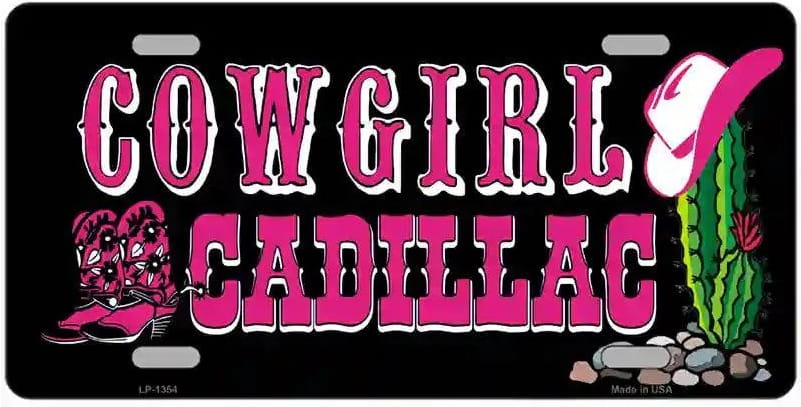 License plate with 'Cowgirl Cadillac' text, pink boot, and cactus design on a black background.