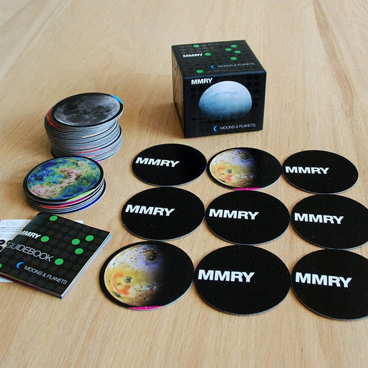 MMRY planet and moon cards on a wooden surface with packaging