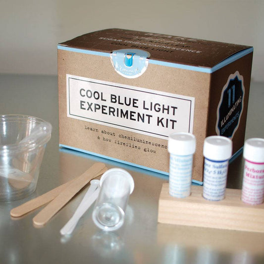 Cool Blue Light Experiment Kit with materials on a gray surface