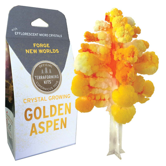 Crystal growing kit with 'Golden Aspen' tree and packaging labeled 'Forge New Worlds'.