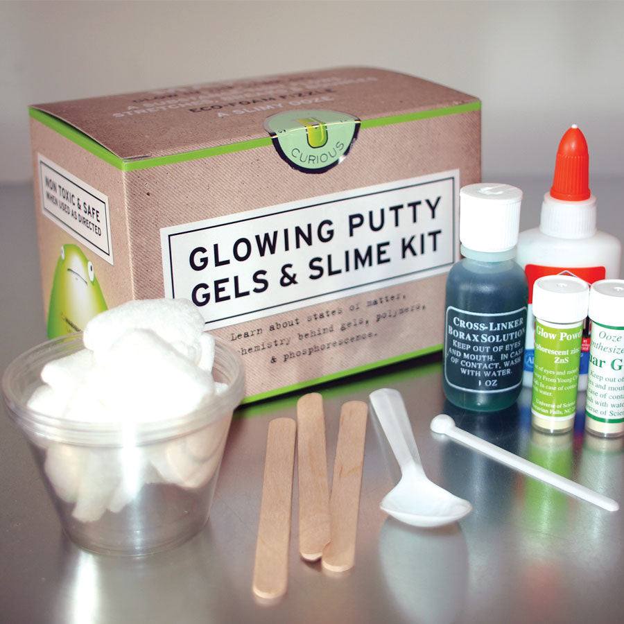 Glowing Putty Gels & Slime Kit with various components on a gray surface
