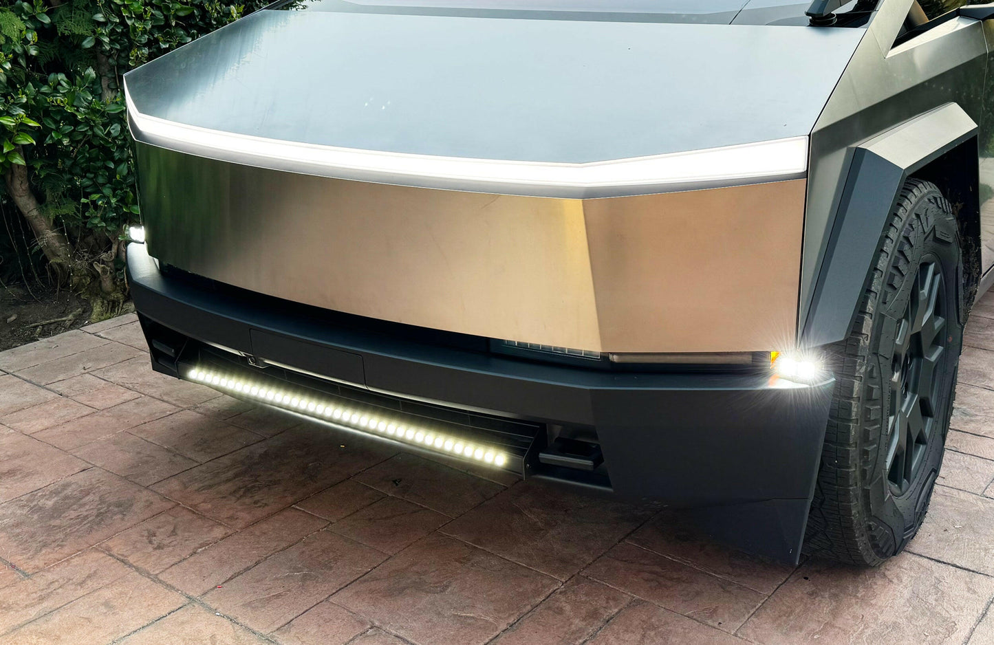 Front view of a tesla vehicle with a Bumper Light Pod.