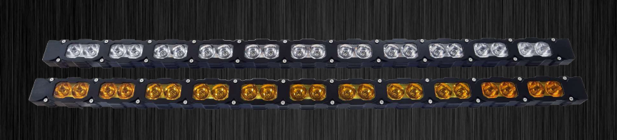 Row of LED lights with black housing on a dark background