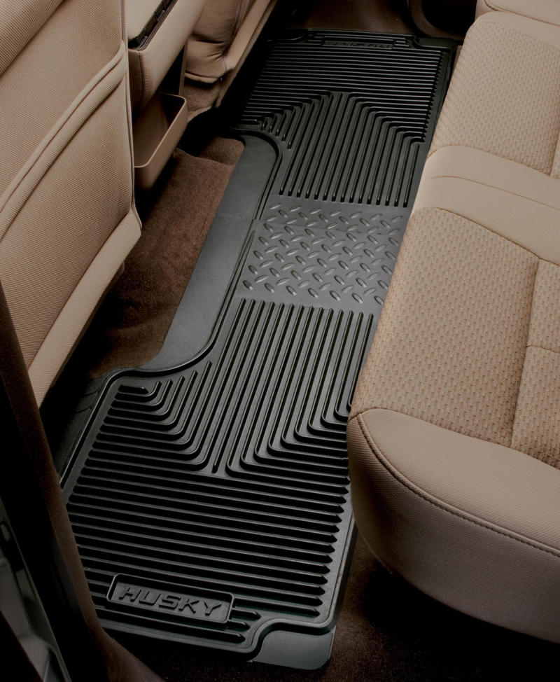 Black Husky floor mats in a vehicle interior
