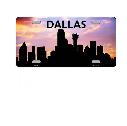 License plate with Dallas skyline and sunset design
