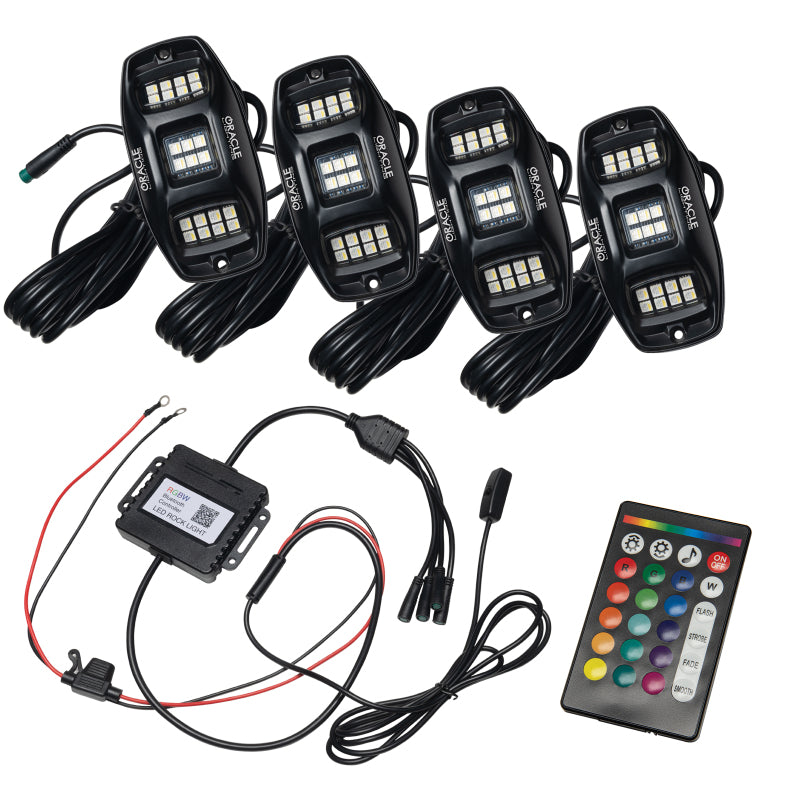 Set of LED rocker switches with wiring harness and remote control on a white background