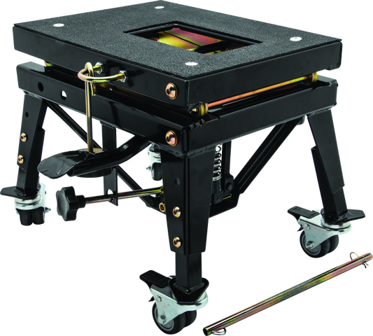 Black mechanical scissor lift with adjustable legs and a platform on a white background