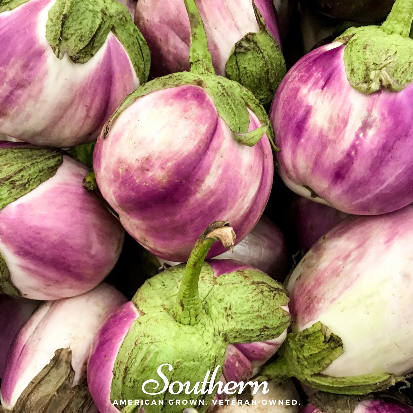 Close-up of purple and green eggplants with 'Southern' brand logo.