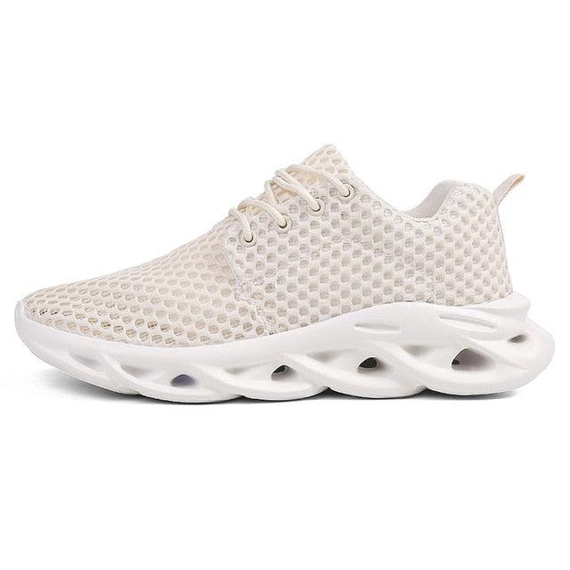 White sneaker with a unique sole design on a white background