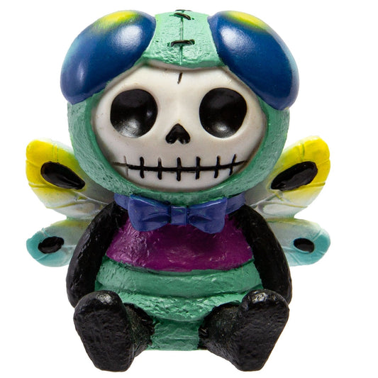 Skeleton figurine with butterfly wings on a white background