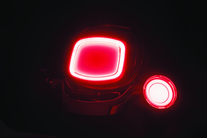 Red light-emitting device on a black background