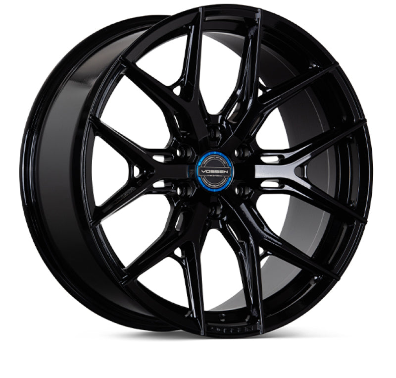 Black alloy wheel with a visible brand logo on a white background