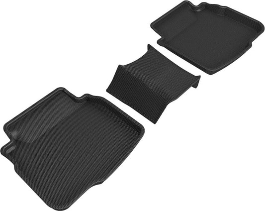 Set of black car floor mats on a white background