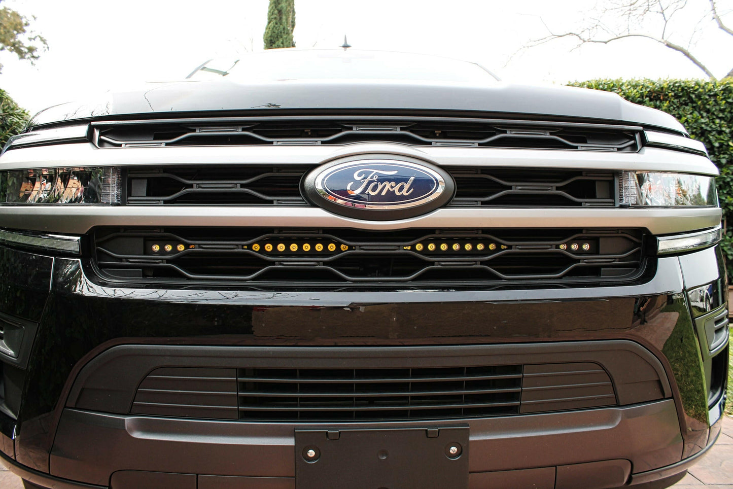 Close-up of a Ford vehicle grille amber colored LED Light Bar