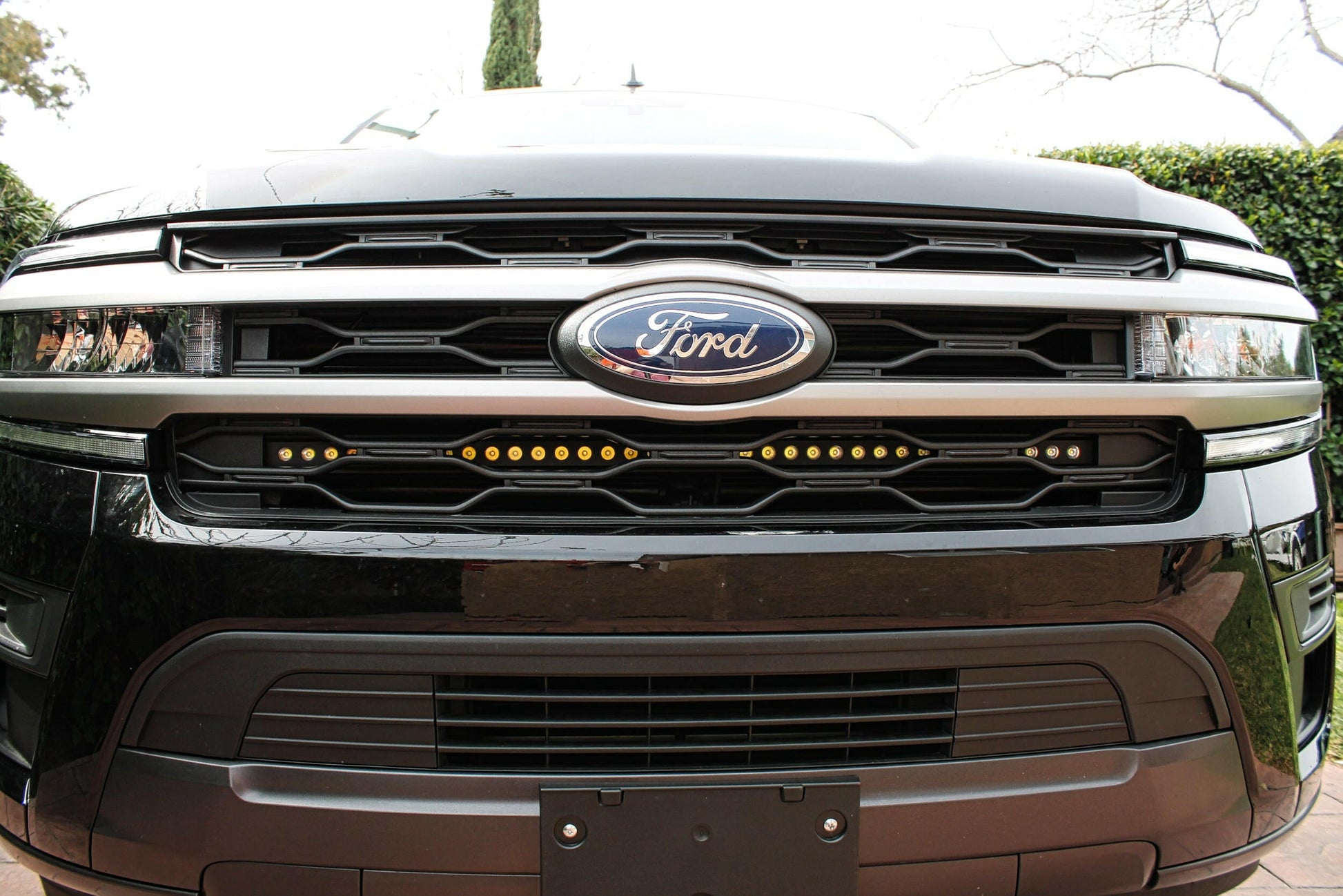 Close-up of a Ford vehicle grille amber colored LED Light Bar