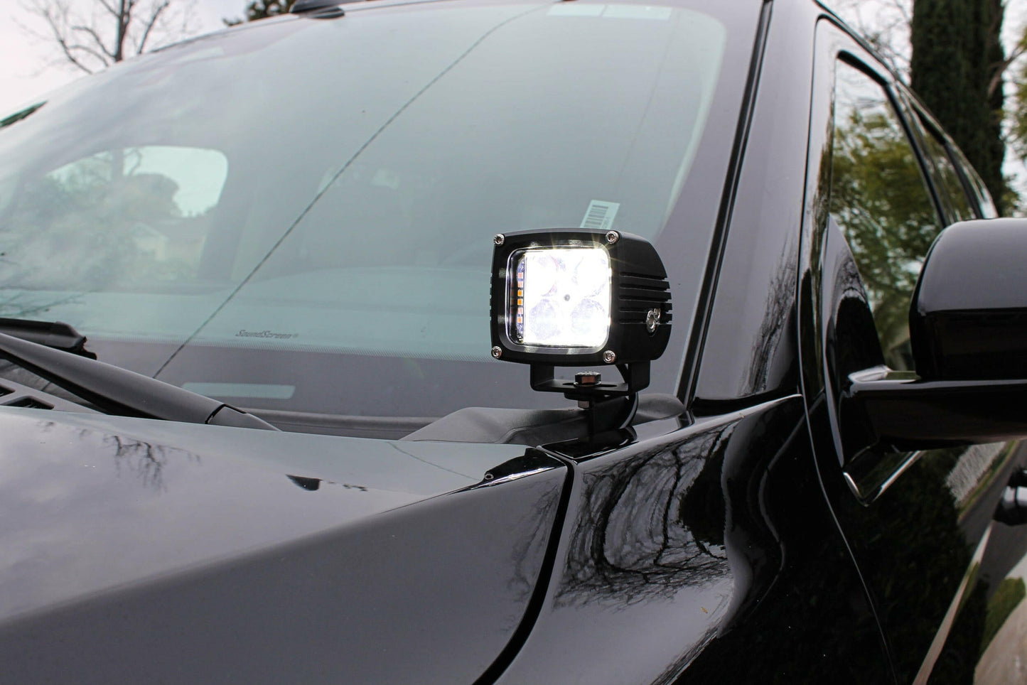 Ford Expedition with a mounted LED work light on the hood