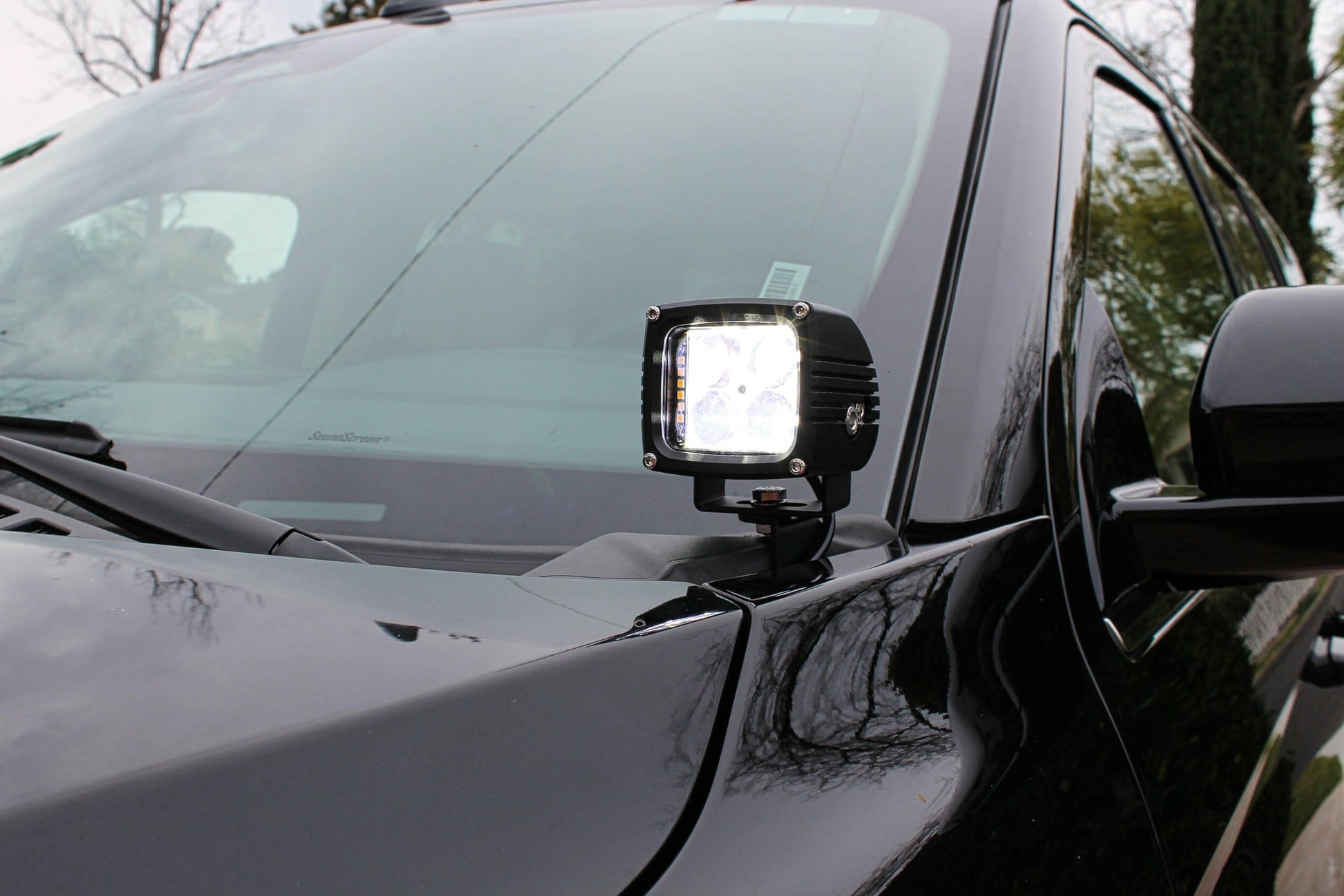 Ford Expedition with a mounted LED work light on the hood