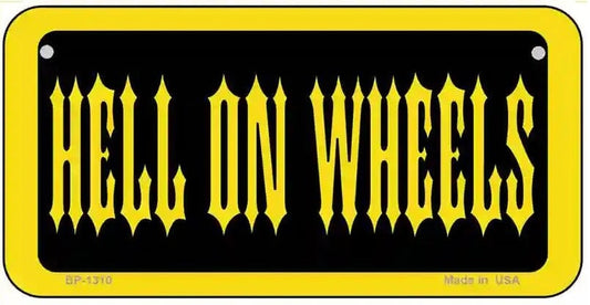 Bicycle License plate with 'HELL ON WHEELS' yellow text on a black background and yellow border