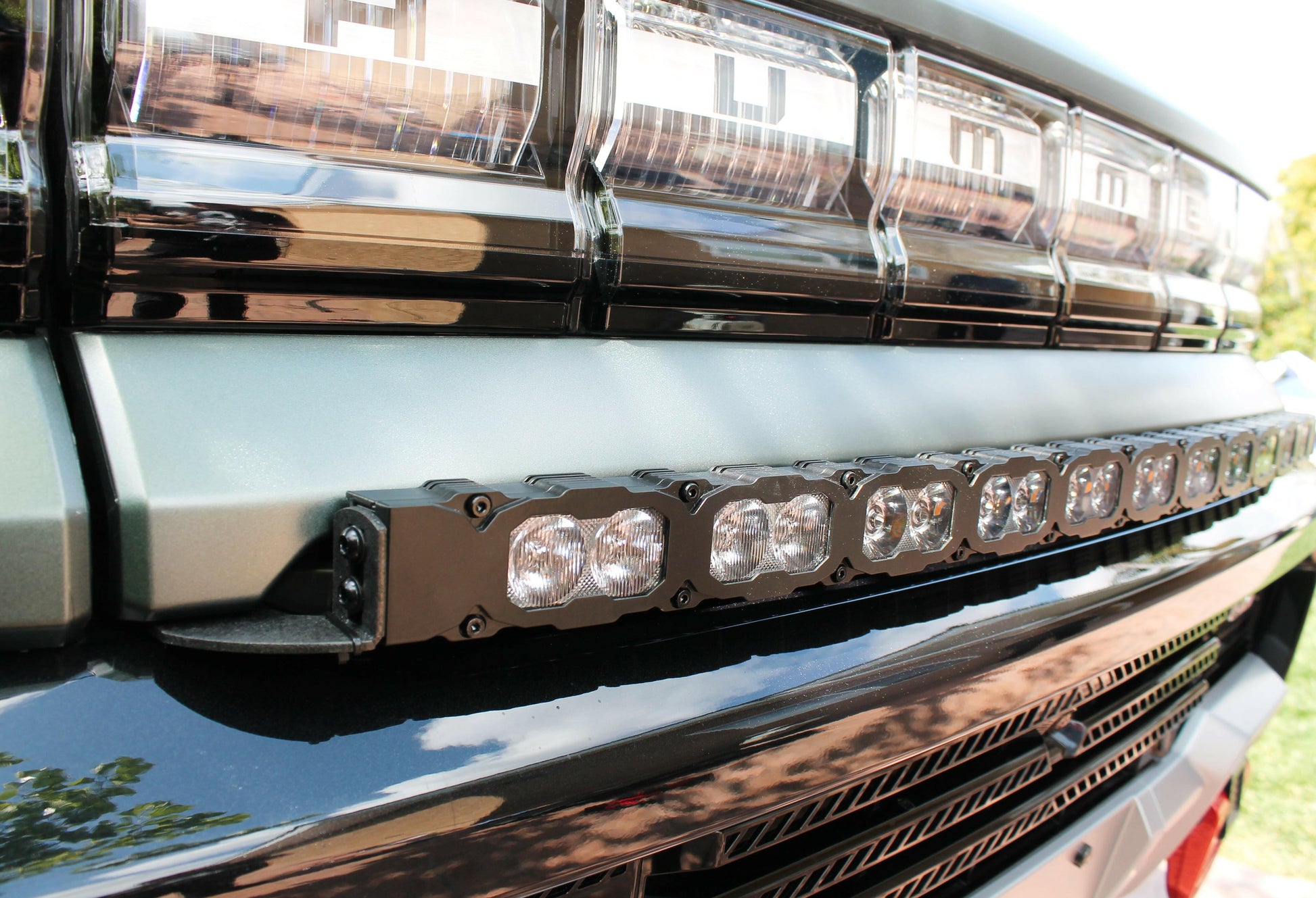 LED light bar on a hummer with a clear sky background