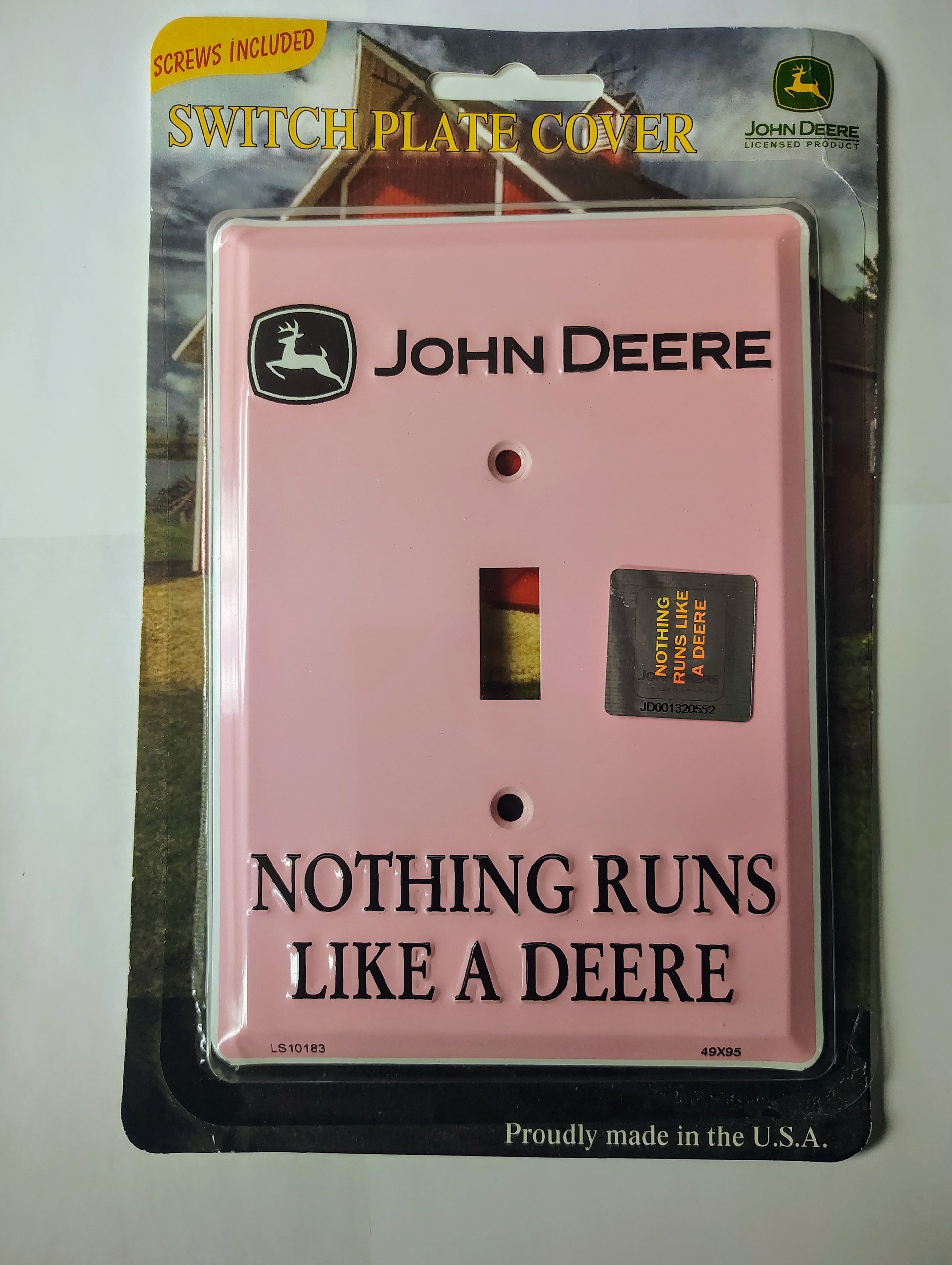 John Deere switch plate cover with packaging on a white background
