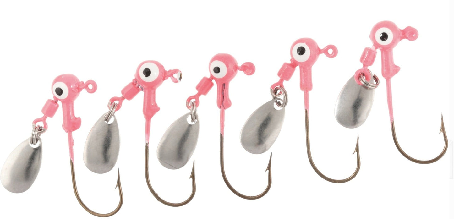 Set of fishing lures with pink and silver designs on a white background