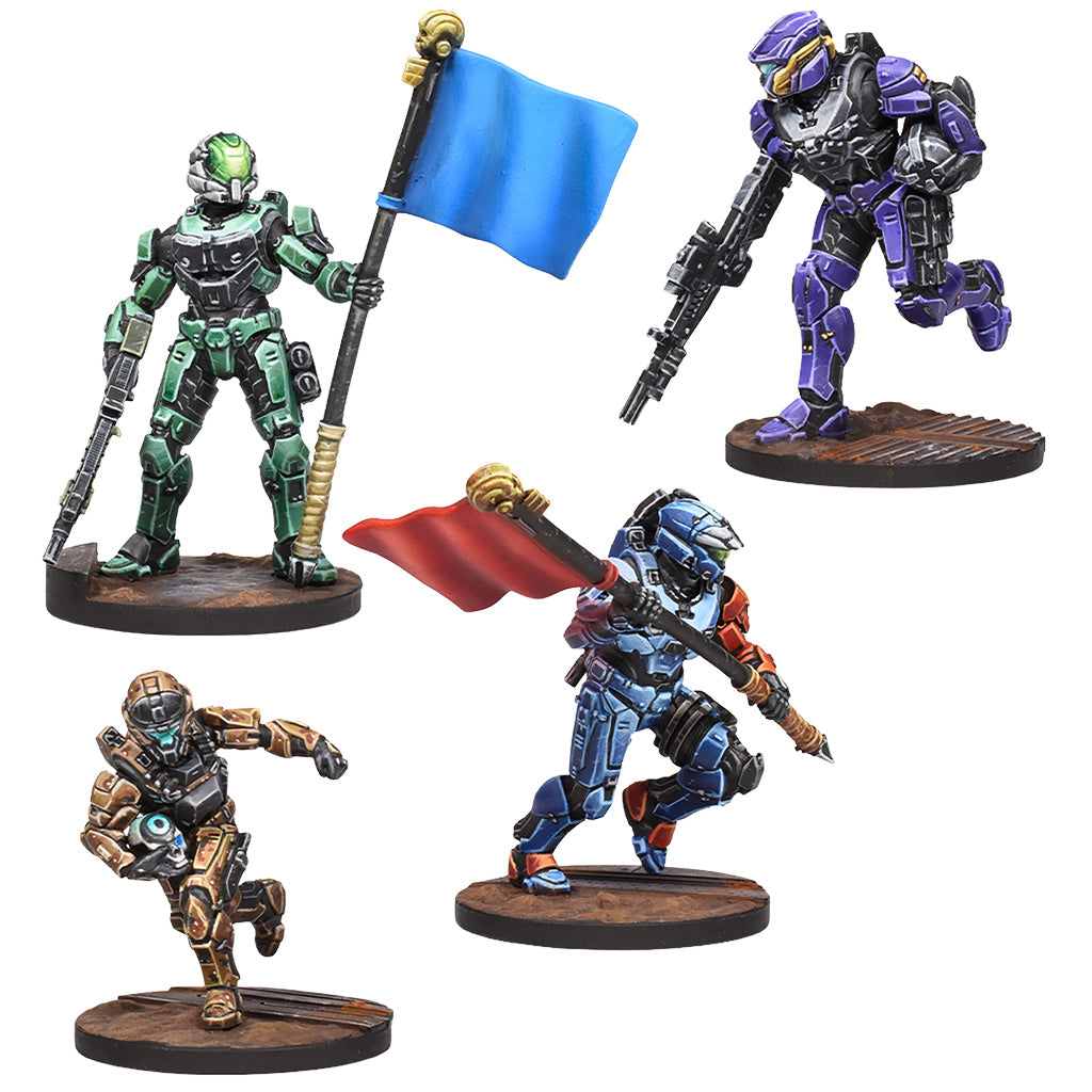 Four action figure toys on a white background